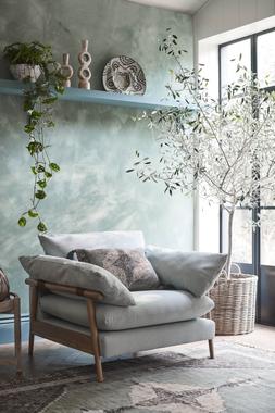 French Connection Hoxton cuddler sofa in ocean, available exclusively at DFS