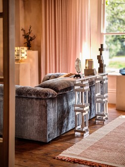 Olson 2.5 Seater in Luxury Textured Chenille Lagoon with Double Power Recliner and Double Power Headrest, £1499. Olson Designer Footstool in Luxury Textured Chenille Brick, £449.