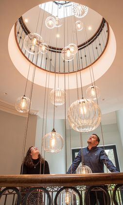 Fritz Fryer bespoke designed stairwell cluster chandelier